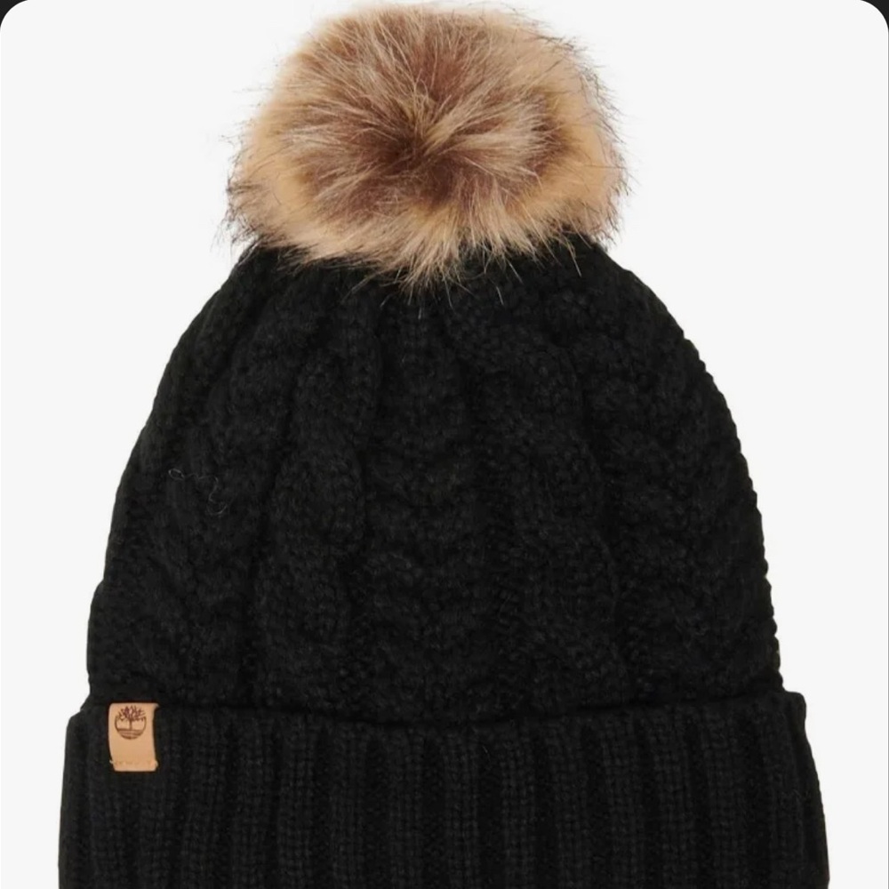 Timberland hat with faux fur pom pom
